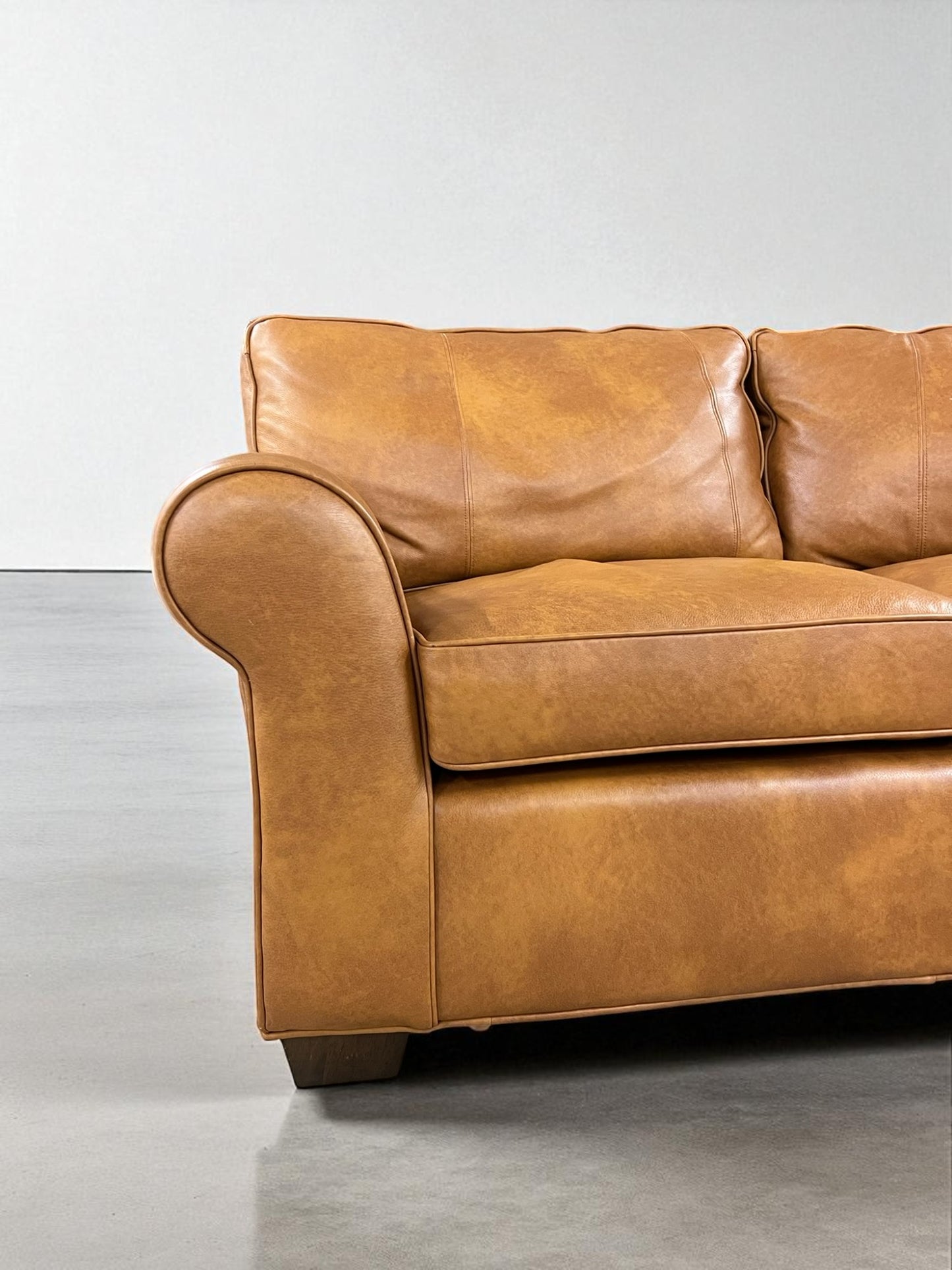 Arhaus Colby Curved Leather Sofa – Pre-Owned, Excellent Like-New
