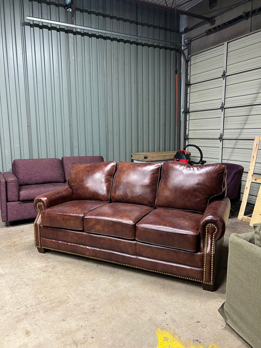 Studded leather pull out bed sofa