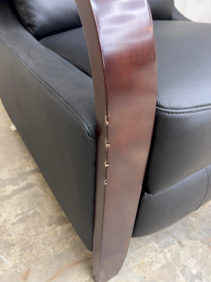 Black Genuine Leather Recliner with Wooden Armrests.