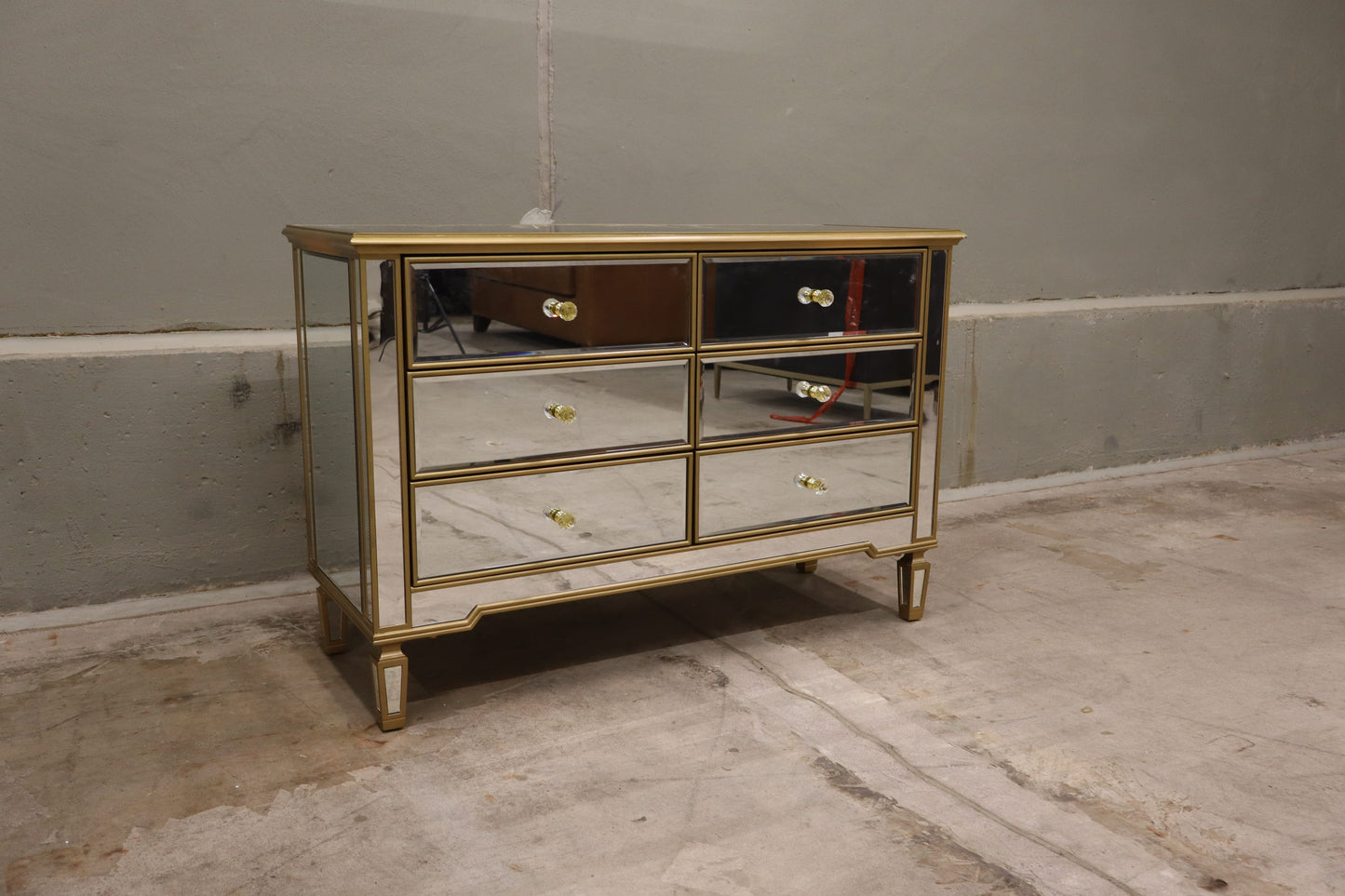 6 Drawer Double Dresser features a mirrored finish with gold trim.
