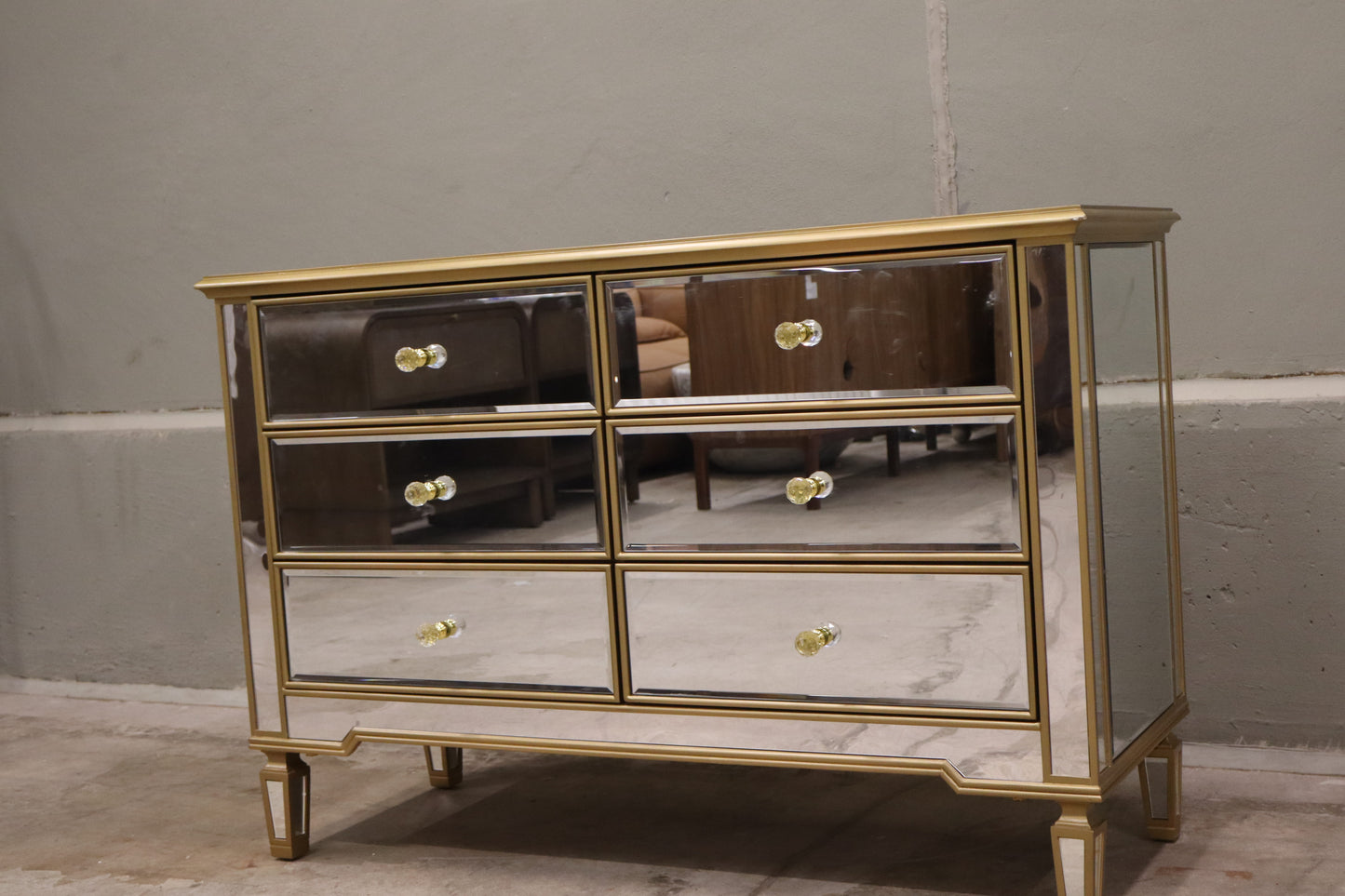 6 Drawer Double Dresser features a mirrored finish with gold trim.