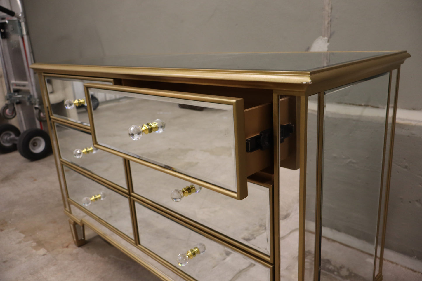 6 Drawer Double Dresser features a mirrored finish with gold trim.