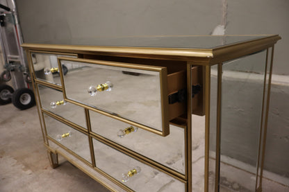 6 Drawer Double Dresser features a mirrored finish with gold trim.