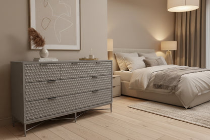 Milo 7 Drawer Dresser, featuring a taupe finish with textured drawer faces and pewter hardware. 