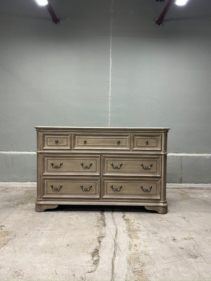 High-end traditional 7 drawer dresser with a soft weathered bisque finish