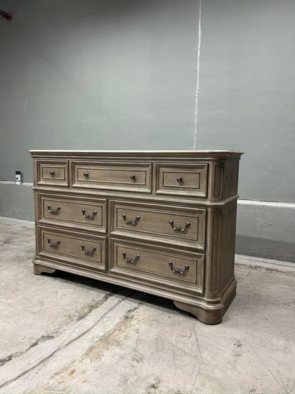 High-end traditional 7 drawer dresser with a soft weathered bisque finish