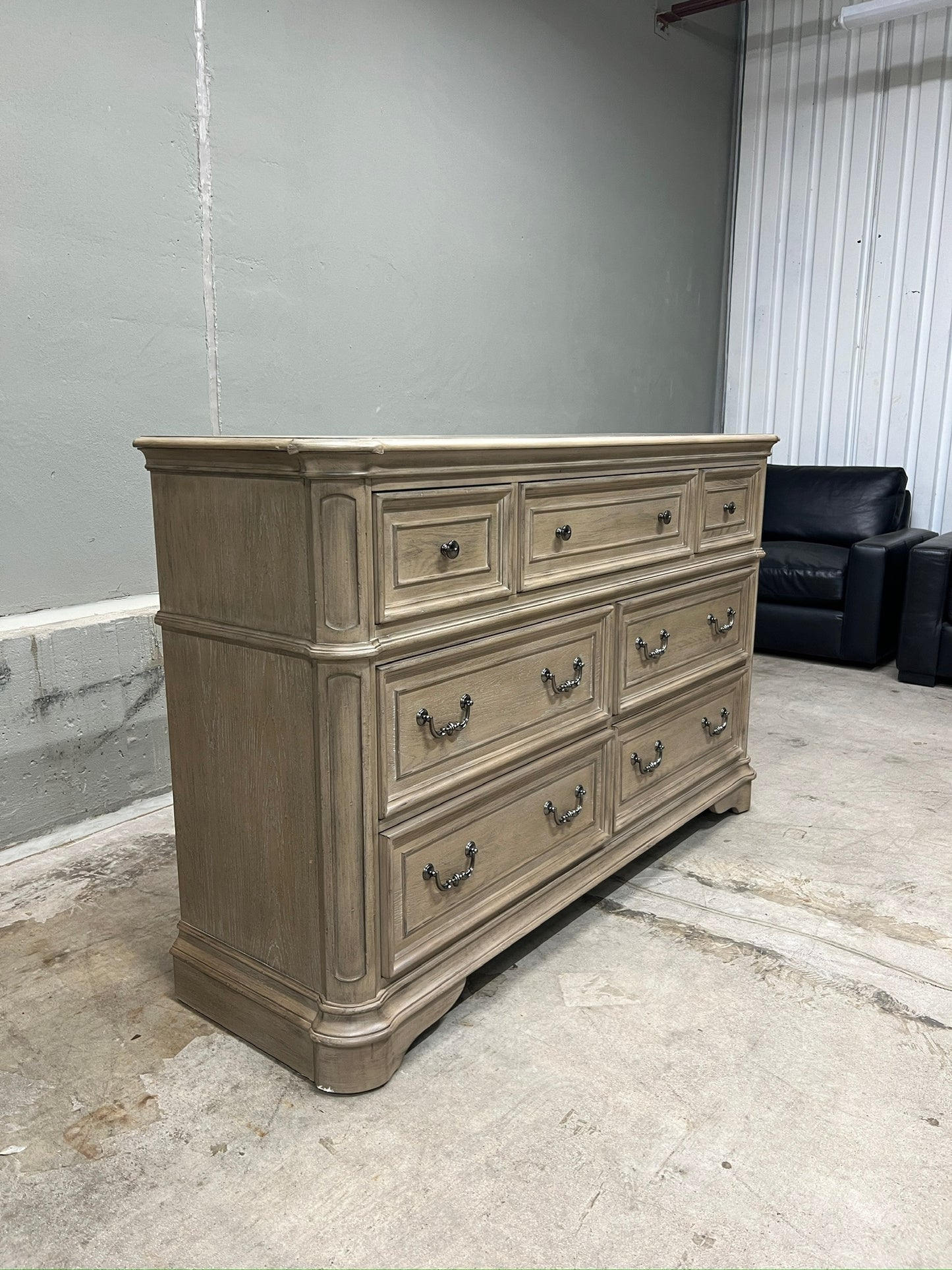 High-end traditional 7 drawer dresser with a soft weathered bisque finish
