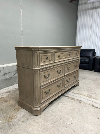 High-end traditional 7 drawer dresser with a soft weathered bisque finish