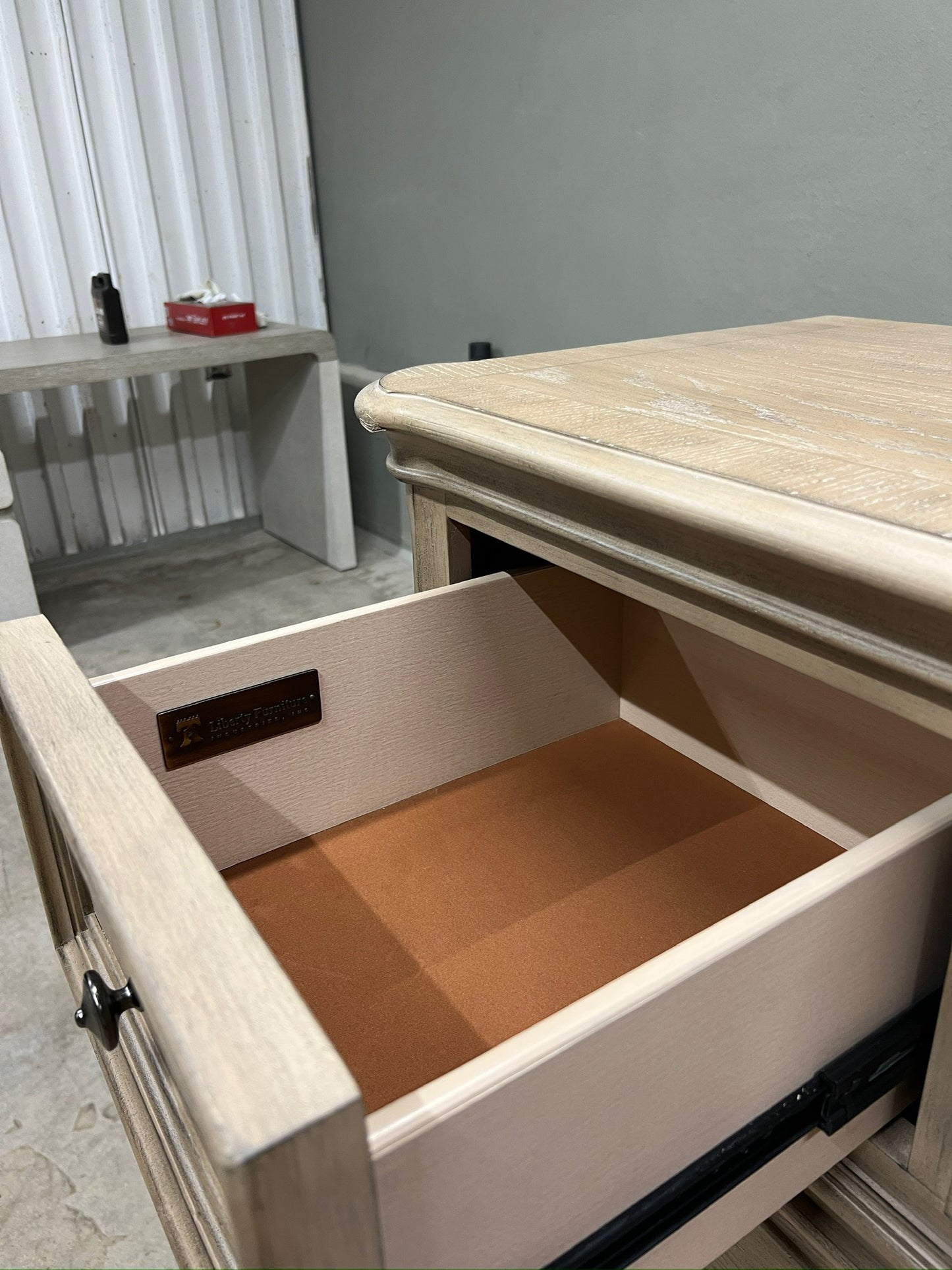 High-end traditional 7 drawer dresser with a soft weathered bisque finish